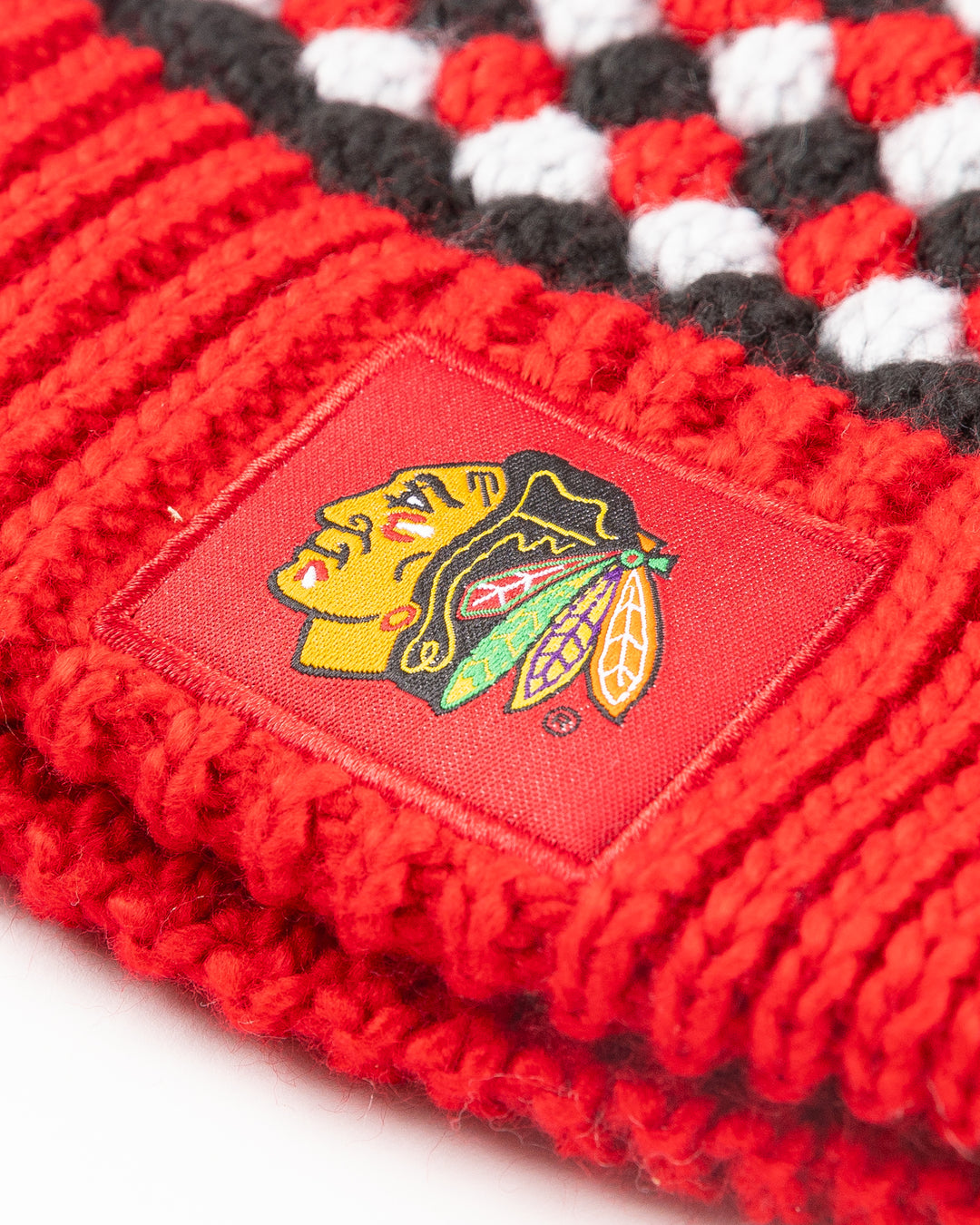 red black and white Colosseum Operation Hat Trick beanie with Chicago Blackhawks branding - detail lay flat