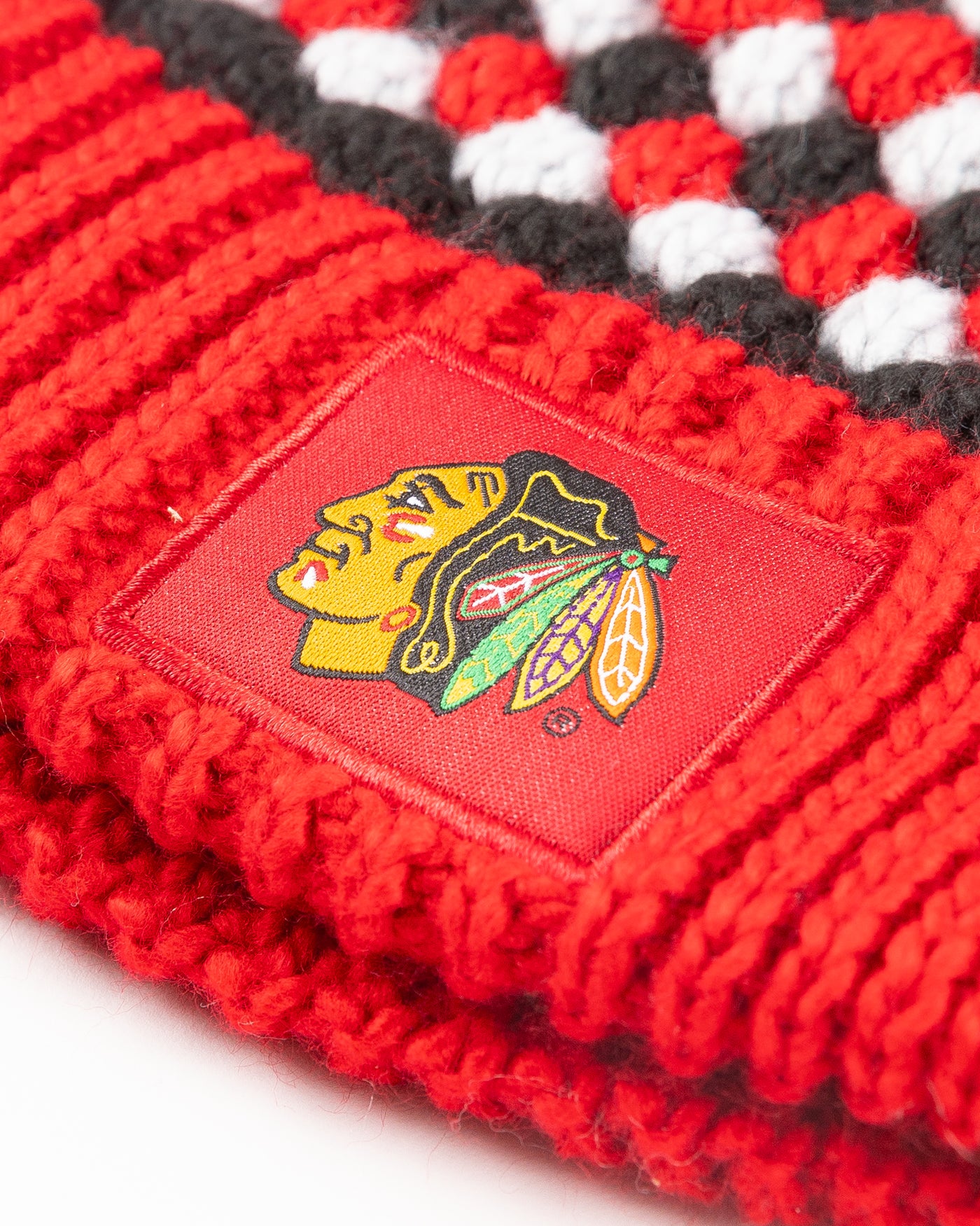 red black and white Colosseum Operation Hat Trick beanie with Chicago Blackhawks branding - detail lay flat