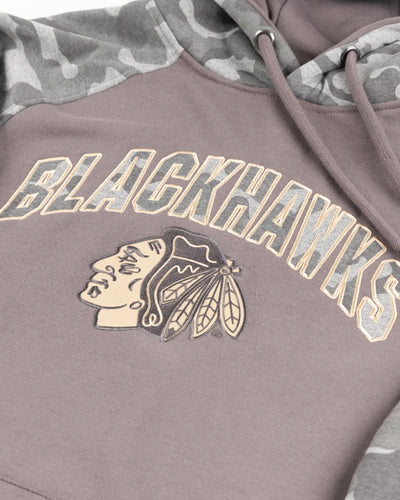 grey camo Colosseum operation hat trick hoodie with Chicago Blackhawks branding - detail lay flat