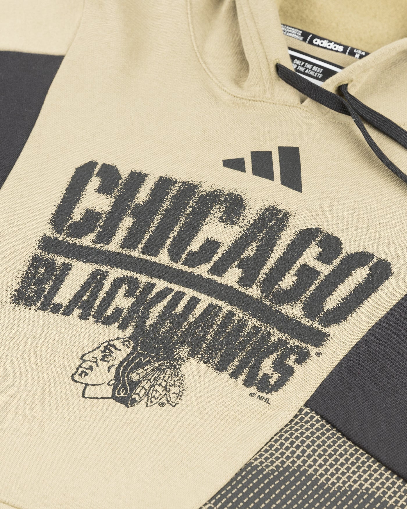 green and black camo colorblocked adidas hoodie with Chicago Blackhawks wordmark and primary logo across chest - detail lay flat