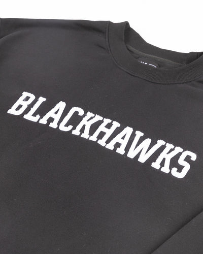 black Line Change crewneck with chenille Blackhawks embroidery across front - detail lay flat