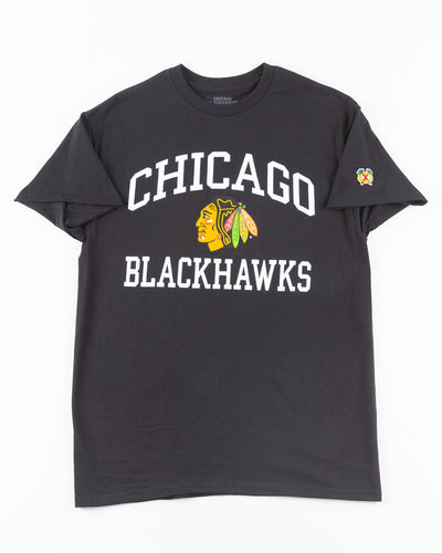 black Chicago Blackhawks short sleeve tee with wordmark and primary logo on chest and secondary logo on left shoulder - front lay flat