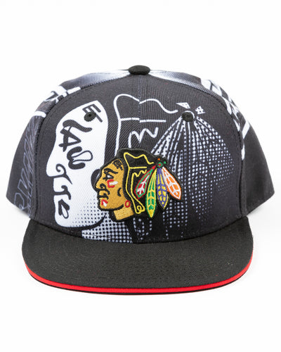 black and white all over print youth snapback cap with Chicago Blackhawks primary logo embroidered on front - front lay flat