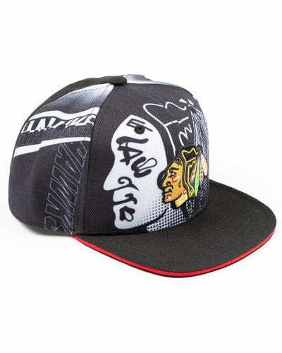 black and white all over print youth snapback cap with Chicago Blackhawks primary logo embroidered on front - right angle lay flat
