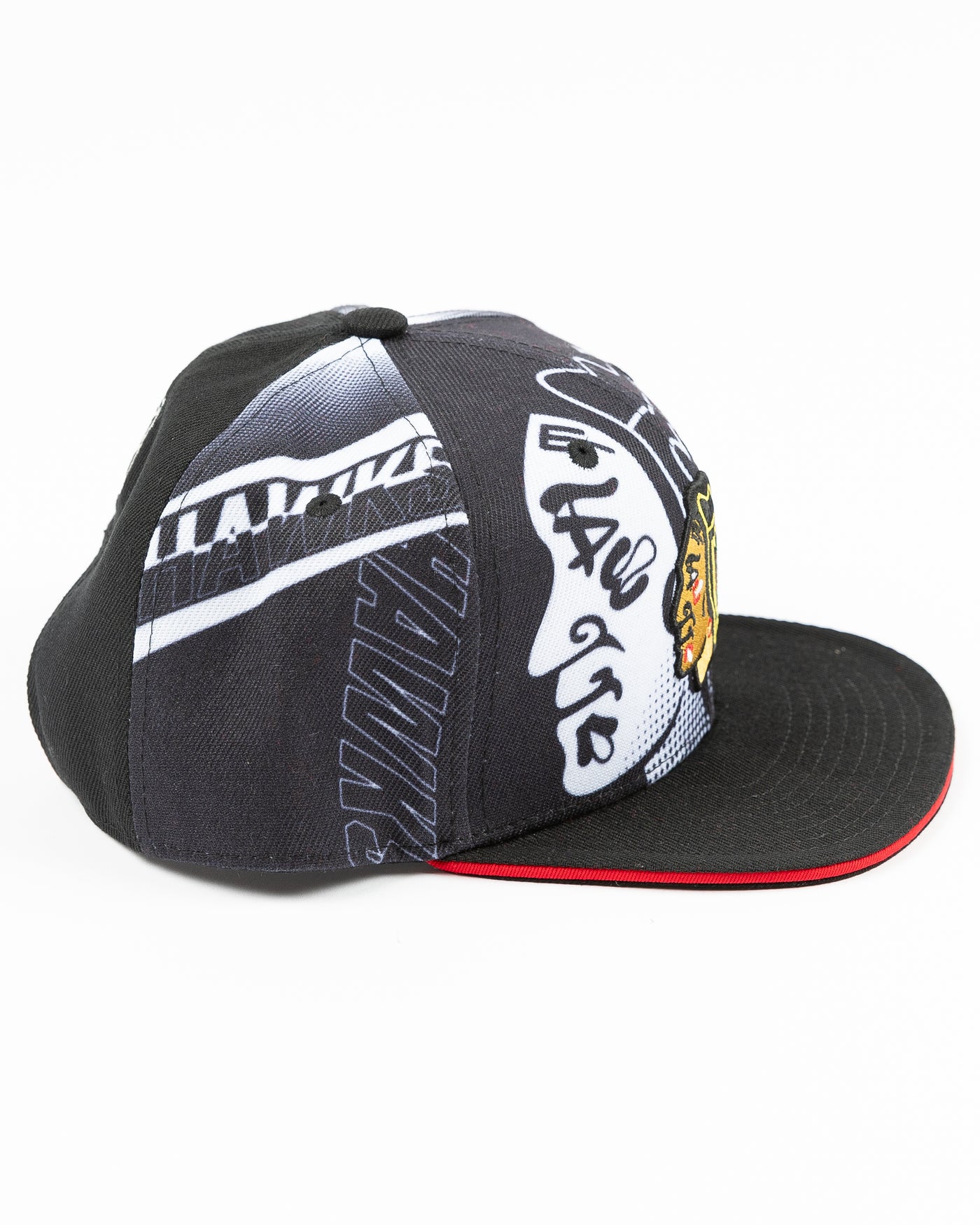black and white all over print youth snapback cap with Chicago Blackhawks primary logo embroidered on front - right side lay flat