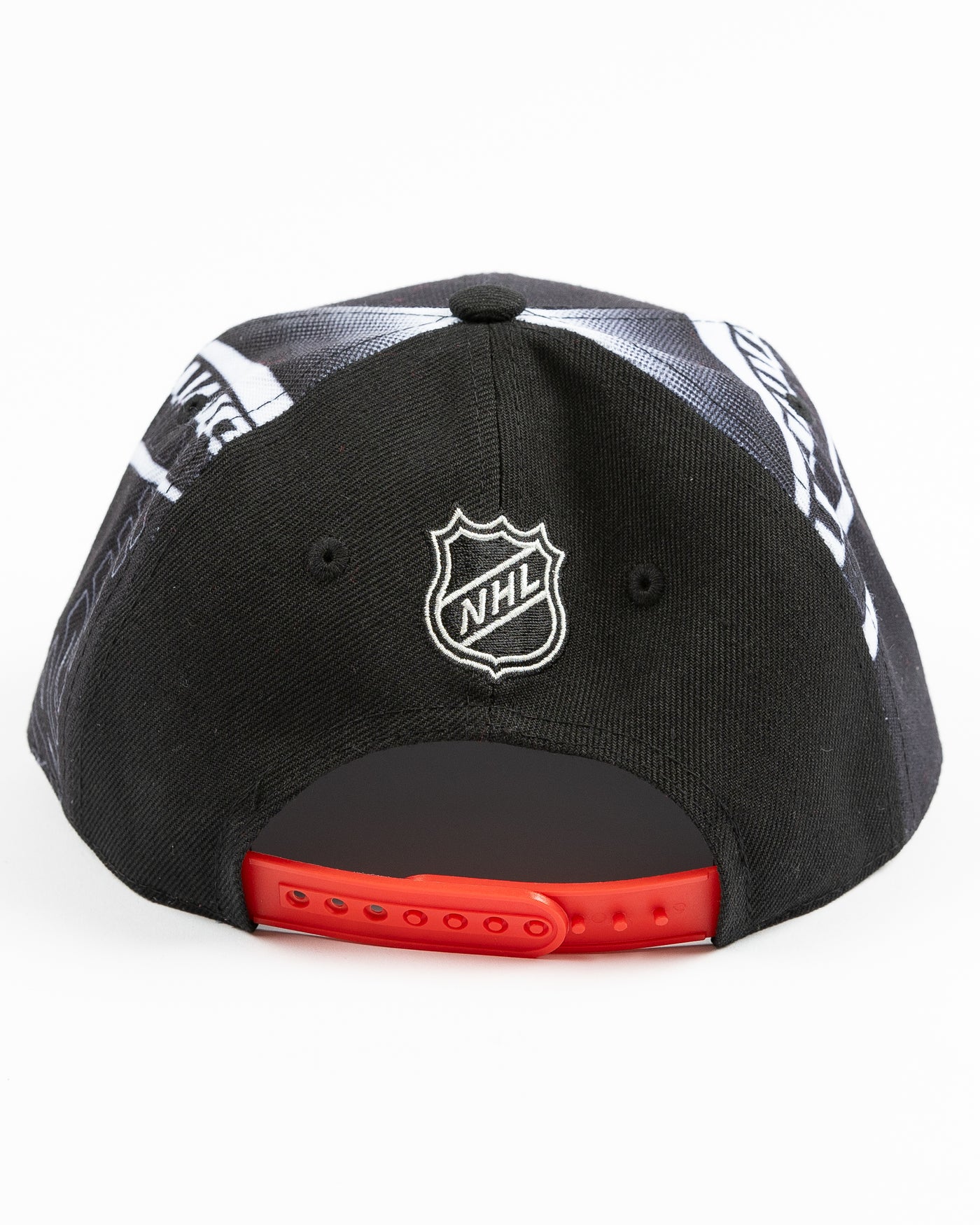 black and white all over print youth snapback cap with Chicago Blackhawks primary logo embroidered on front - back lay flat