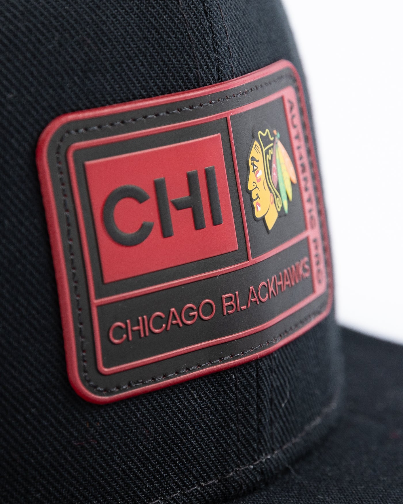 black Fanatics Authentic Pro snapback with Chicago Blackhawks rubberized patch on front - detail lay flat