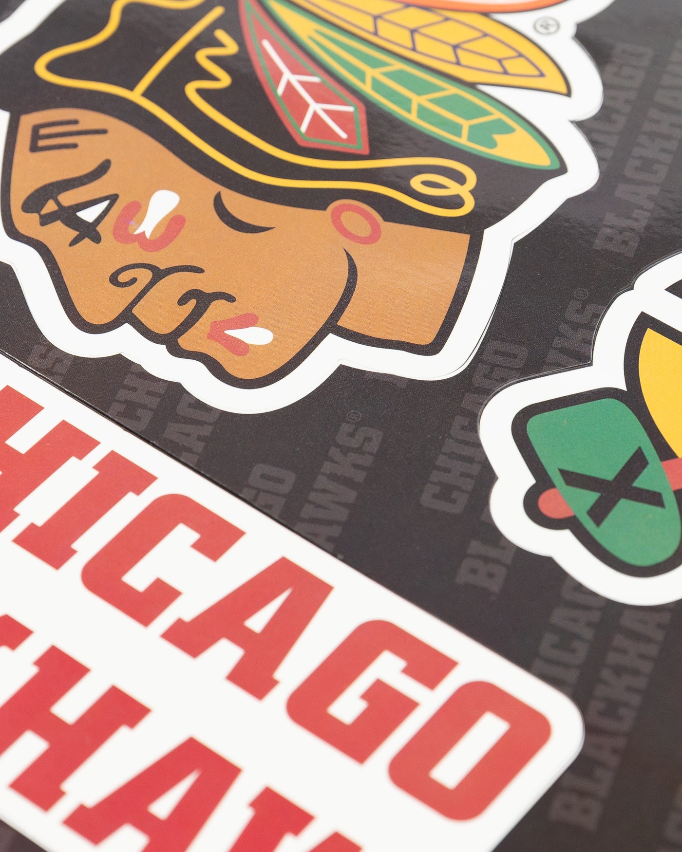Set of three magnets of Chicago Blackhawks primary logo, secondary logo and wordmark - detail lay flat