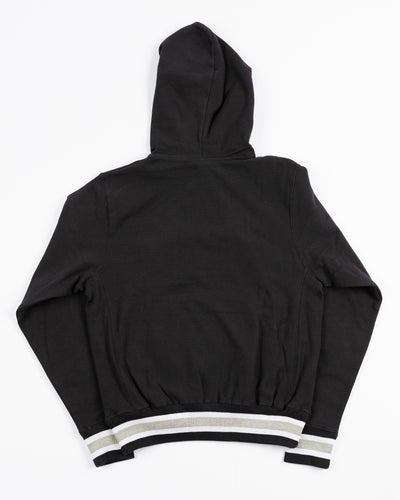 black Champion reverse weave hoodie with Chicago Blackhawks wordmark embroidered on the front - back lay flat