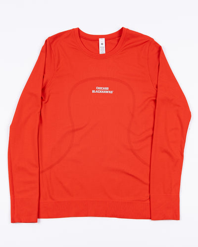 red lululemon ladies long sleeve tee with Chicago Blackhawks wordmark on chest - front lay flat