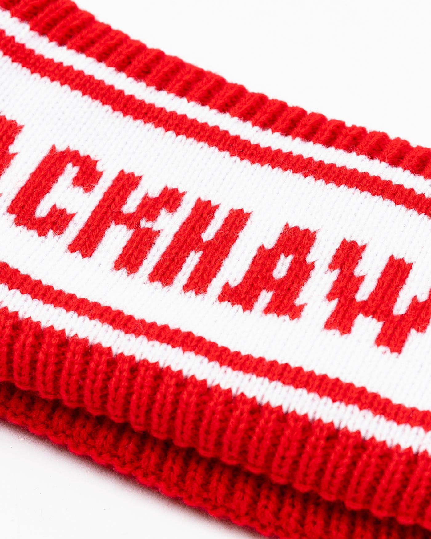 red and white Zoozatz knit headband with Chicago Blackhawks wordmark - detail lay flat
