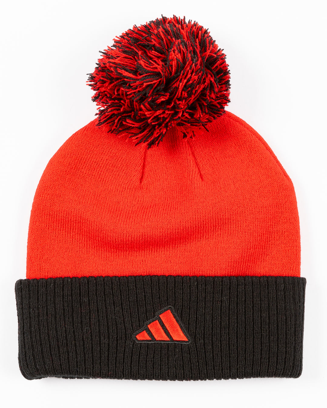 red and black adidas knit pom hat with Chicago Blackhawks primary logo collegiate inspired patch on cuff - back lay flat