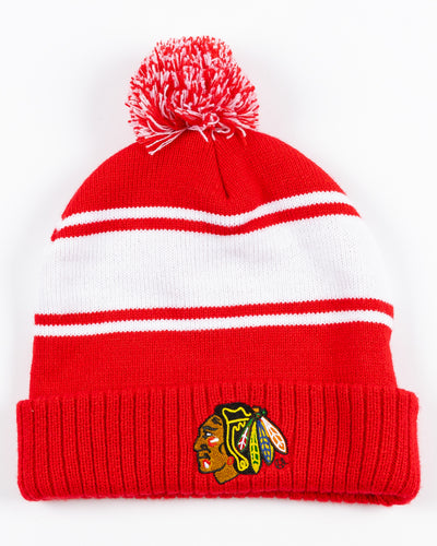 red and white stripe Zoozatz women's kit beanie with pom and Chicago Blackhawks primary logo embroidered on front - front lay flat