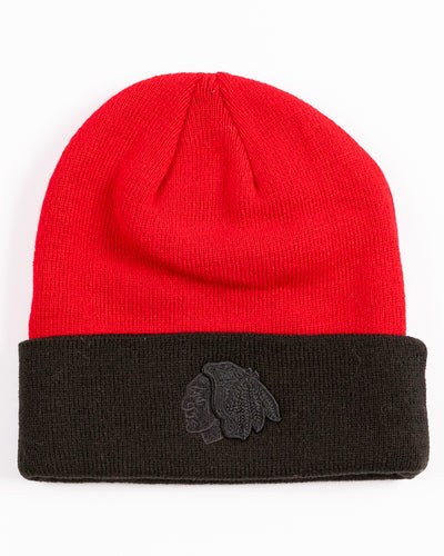 two tone youth knit beanie with Chicago Blackhawks tonal primary logo embroidered on cuff and wordmark embroidered on back - front lay flat