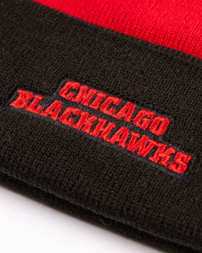 two tone youth knit beanie with Chicago Blackhawks tonal primary logo embroidered on cuff and wordmark embroidered on back - alt detail lay flat