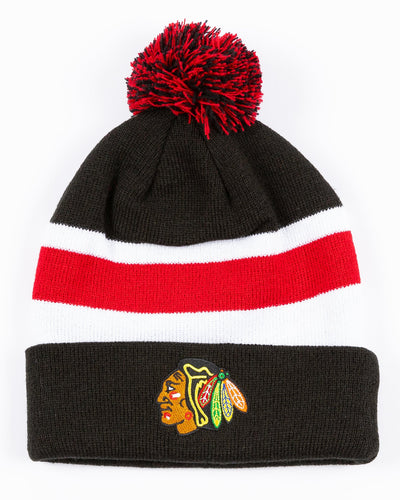 black, red and white Mitchell & Ness beanie with Chicago Blackhawks primary logo embroidered on front cuff and pom on top - front lay flat