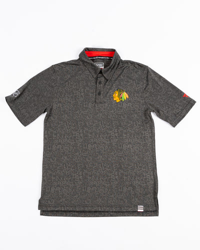 black Fanatics jacquard polo with Chicago Blackhawks primary logo on left chest - front lay flat