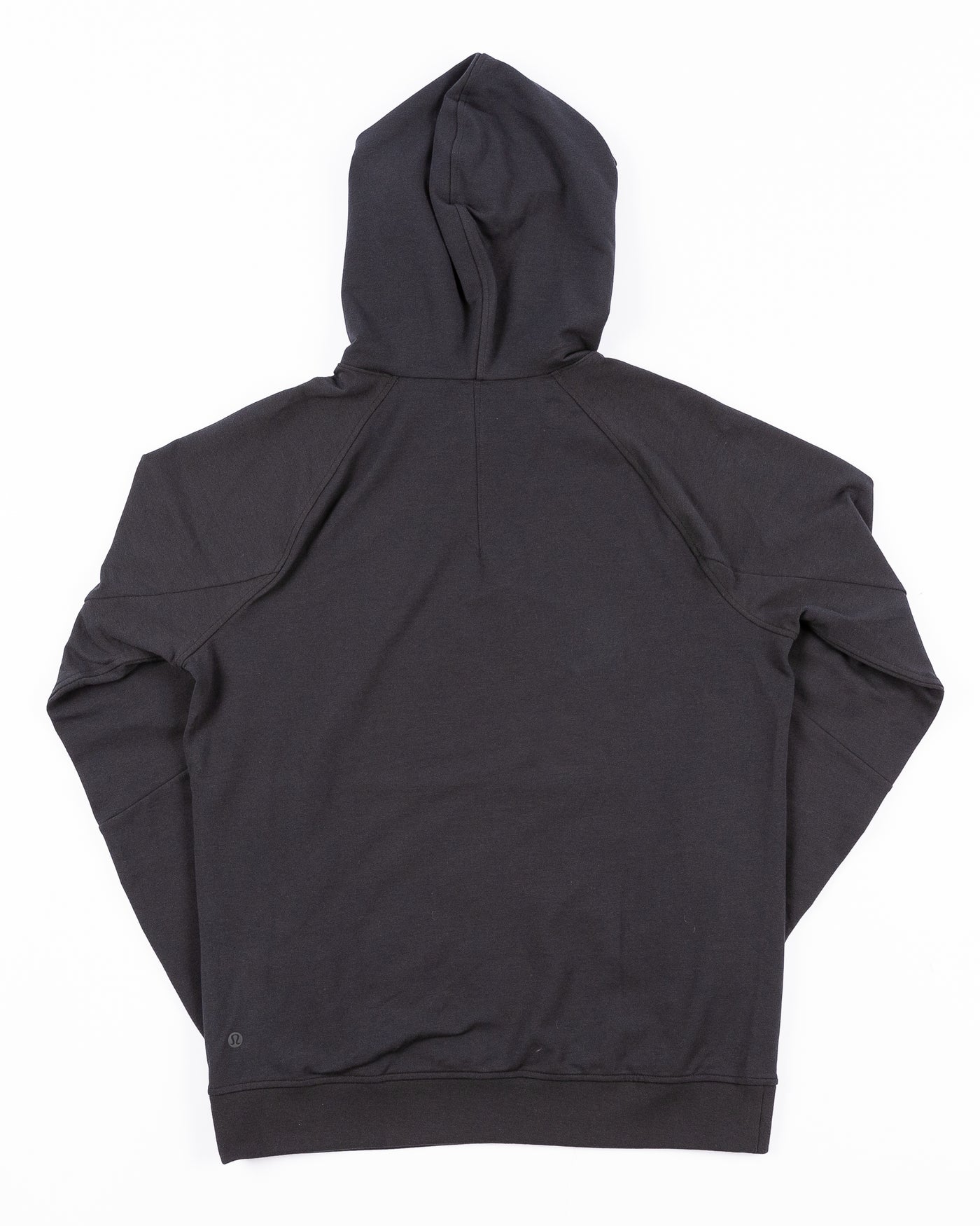 black lululemon hoodie with tonal Chicago Blackhawks primary logo printed on left chest - back lay flat