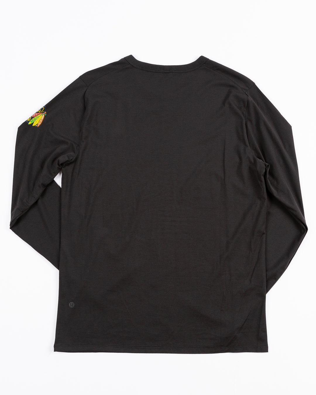 black lululemonn long sleeve tee with Chicago Blackhawks primary logo on left shoulder - back lay flat