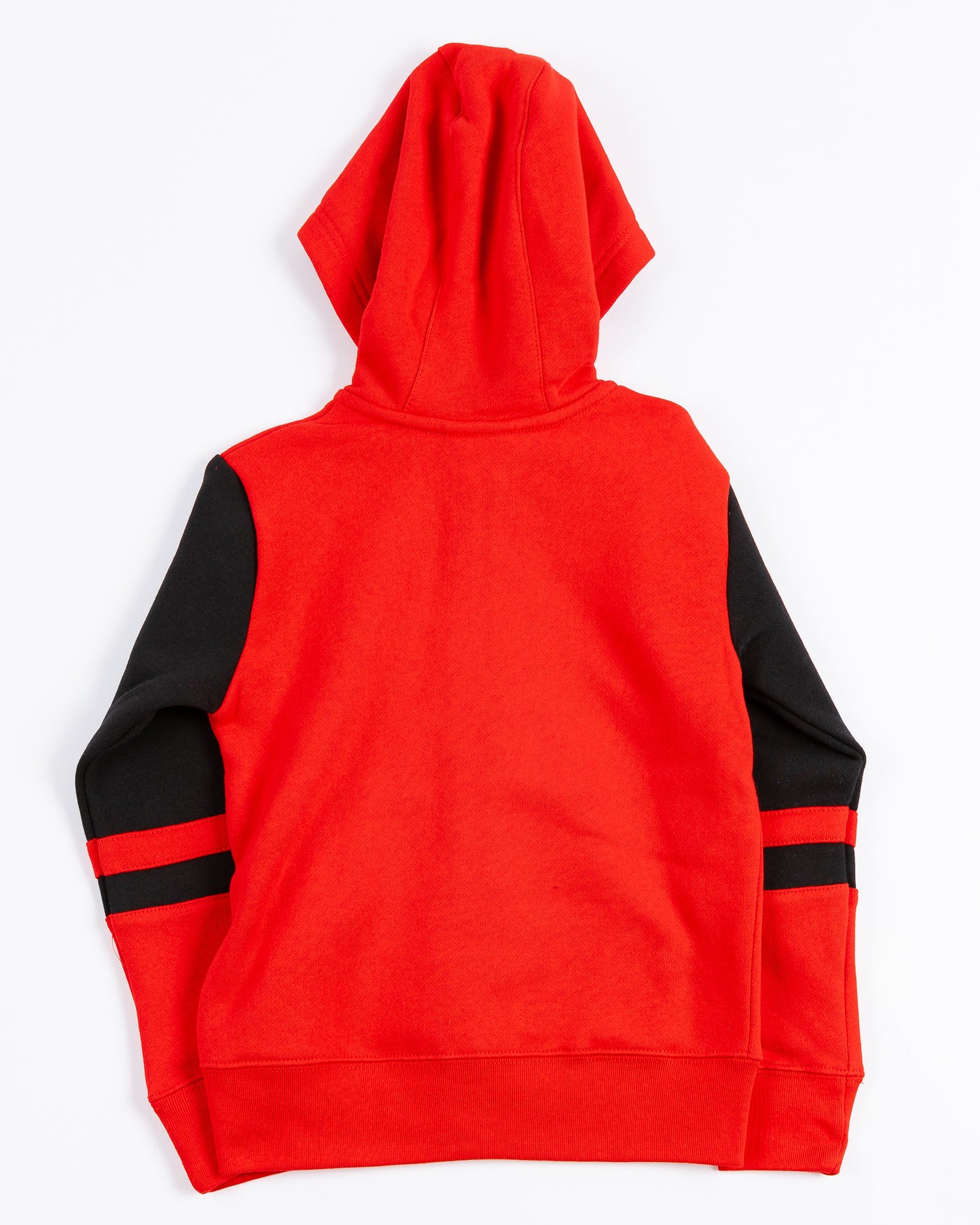 youth Champion zip up hoodie with red and black color block design and Chicago Blackhawks primary logos on left chest and right sleeve - back lay flat