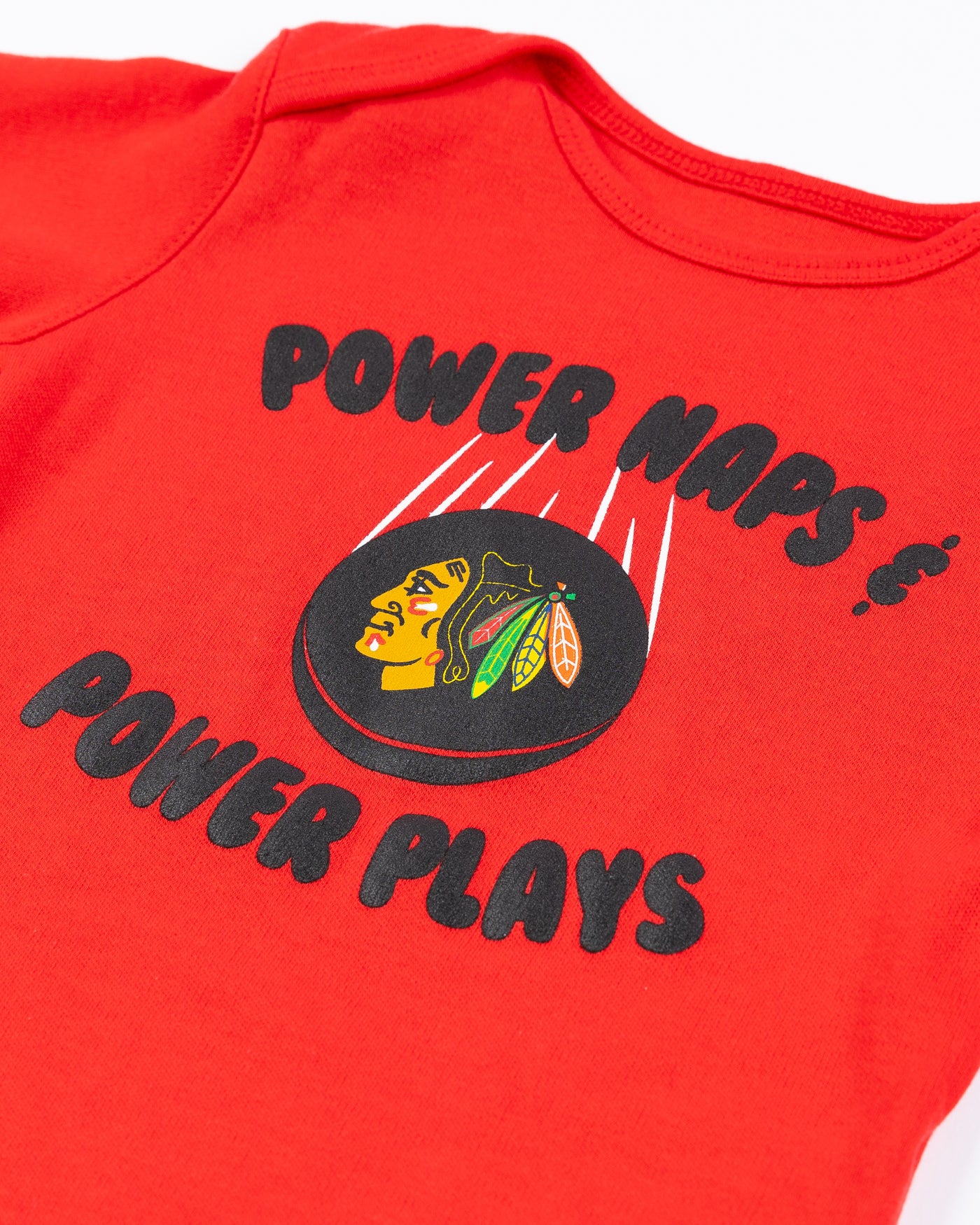 red infant onesie with Chicago Blackhawks primary logo and power naps and power plays graphic on front - detail lay flat
