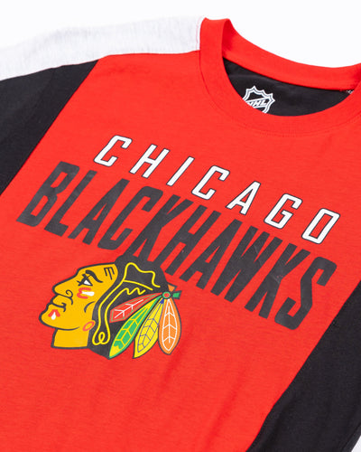 red black and grey color blocked youth tee with Chicago Blackhawks wordmark and primary logo graphic across front - detail lay flat