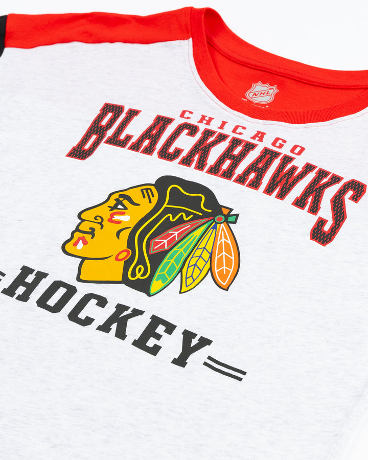 grey black and red color blocked youth tee with Chicago Blackhawks wordmark and primary logo across chest - detail lay flat