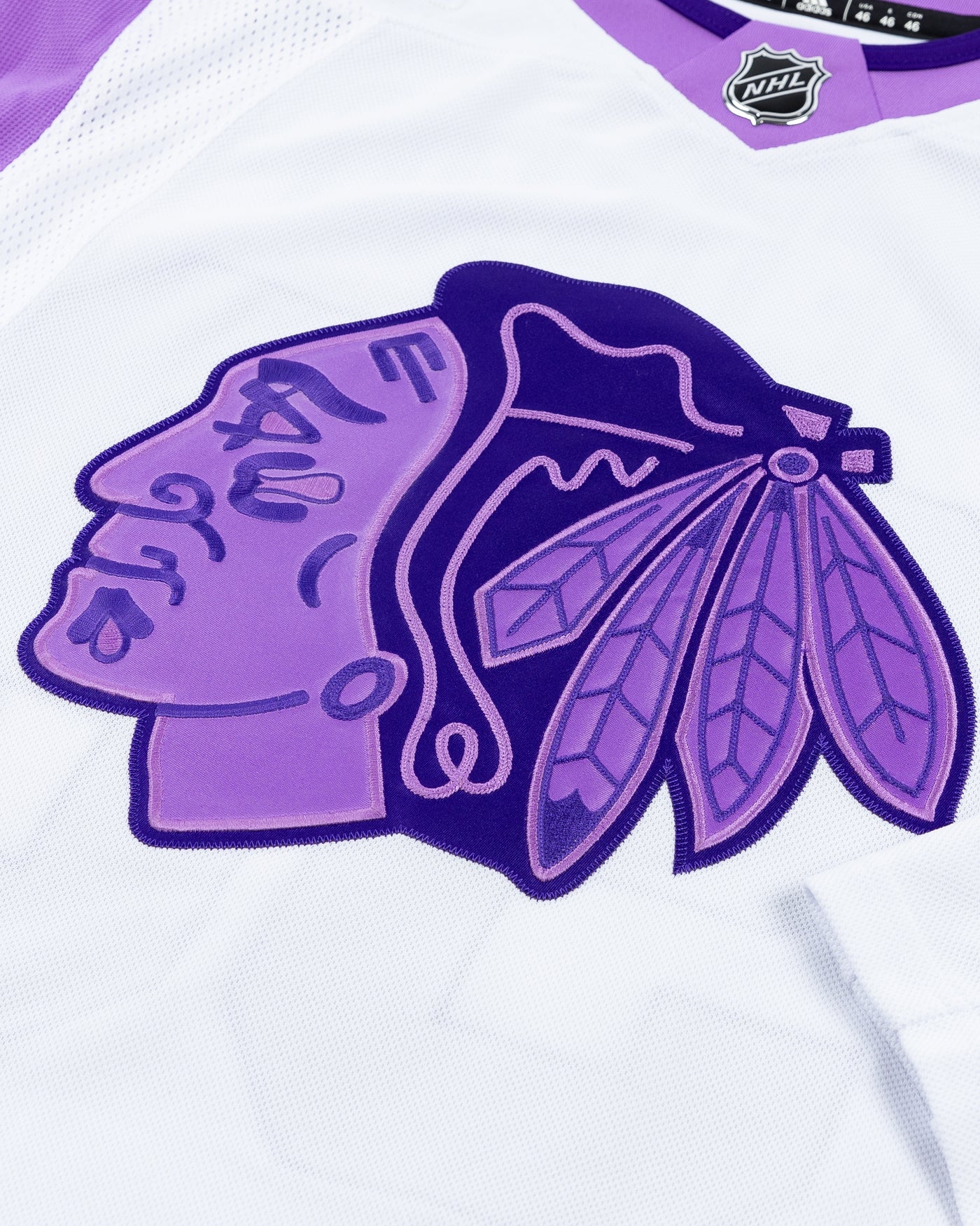 adidas hockey fights cancer Chicago Blackhawks official jersey with Connor Bedard name and number pro stitched - front detail lay flat 