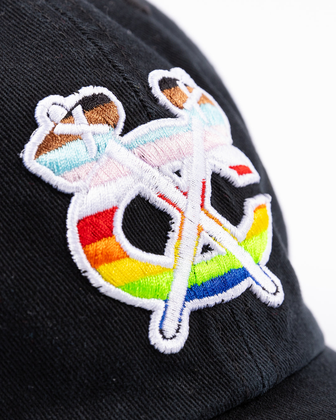 black '47 adjustable hat with Chicago Blackhawks secondary logo in pride colorway embroidered on the front - detail lay flat