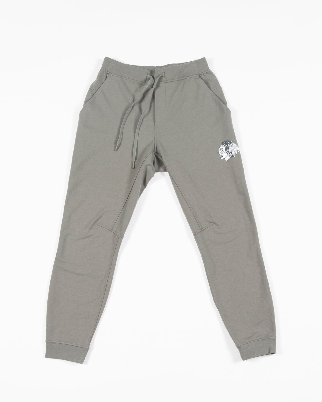 sage green lululemon sweatpant joggers with black and white Chicago Blackhawks primary logo on left thigh - front lay flat