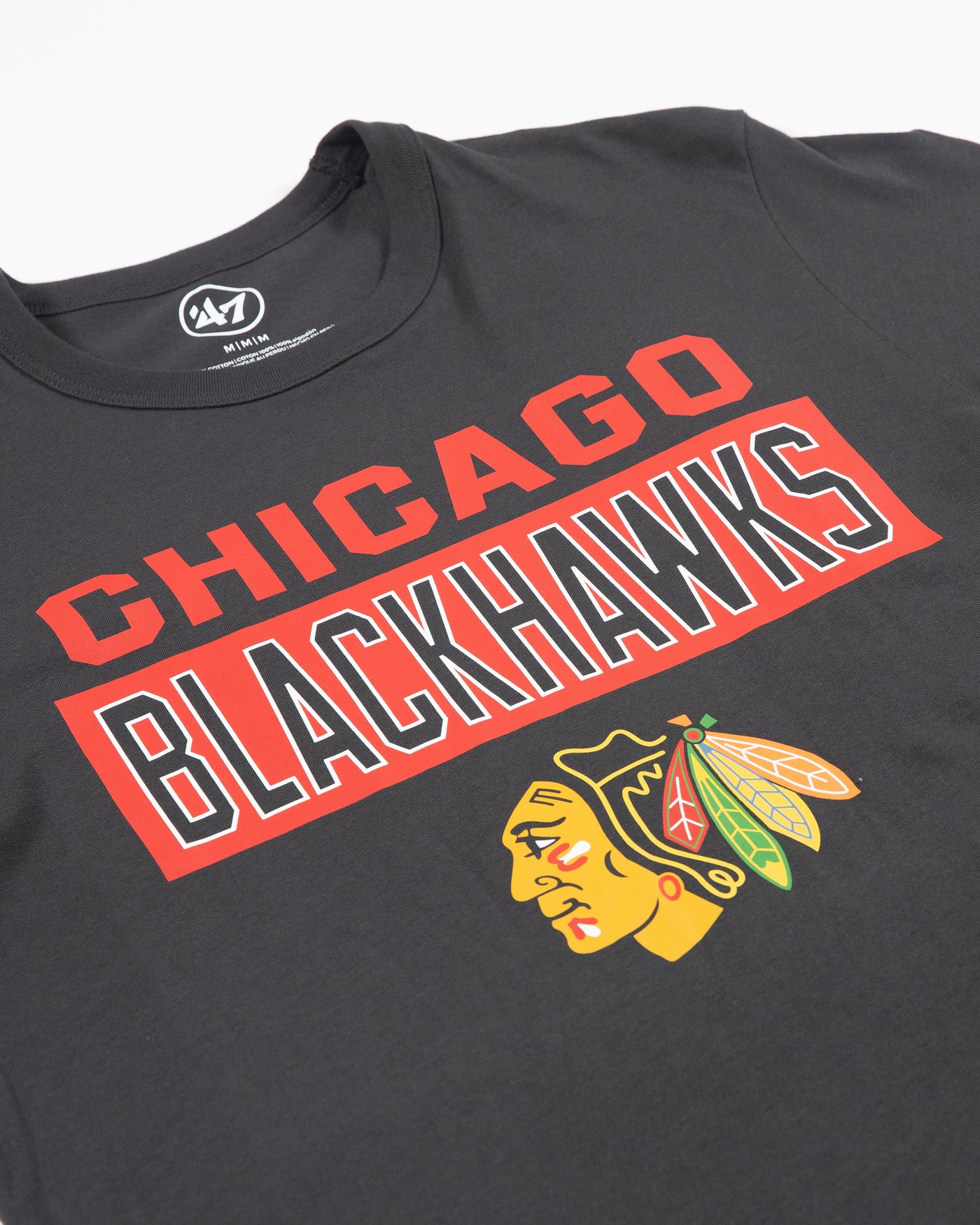 '47 brand black tee with Chicago Blackhawks wordmark and primary logo across chest - detail front lay flat