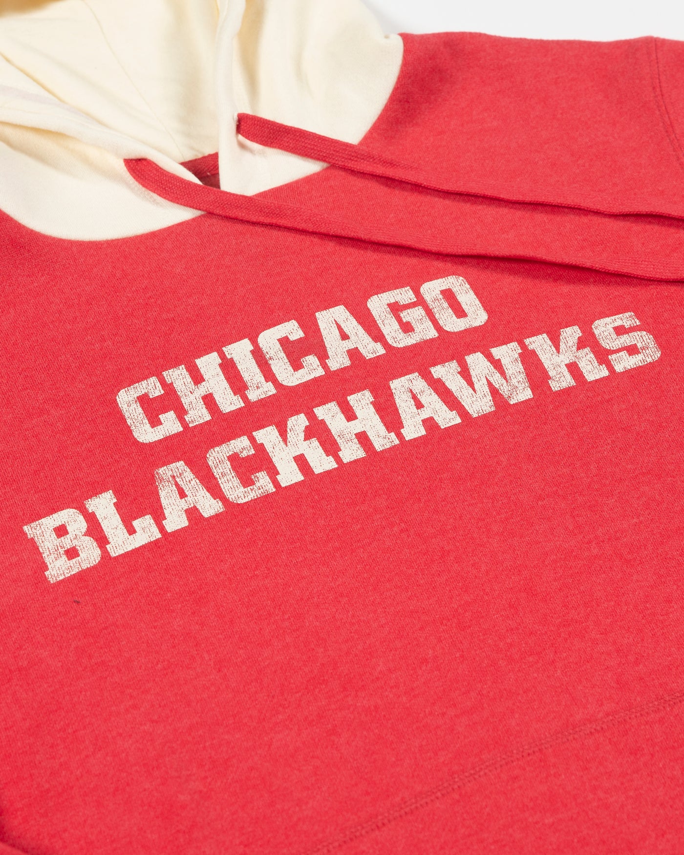 '47 brand hoodie with contrasting hood and two stripes on each arm and Chicago Blackhawks wordmark across the chest - detail front lay flat