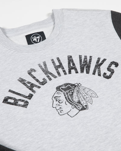 grey '47 brand crewneck sweatshirt with dark grey contrasting sleeves and vintage Blackhawks wordmark and primary logo graphic across chest - detail front lay flat 
