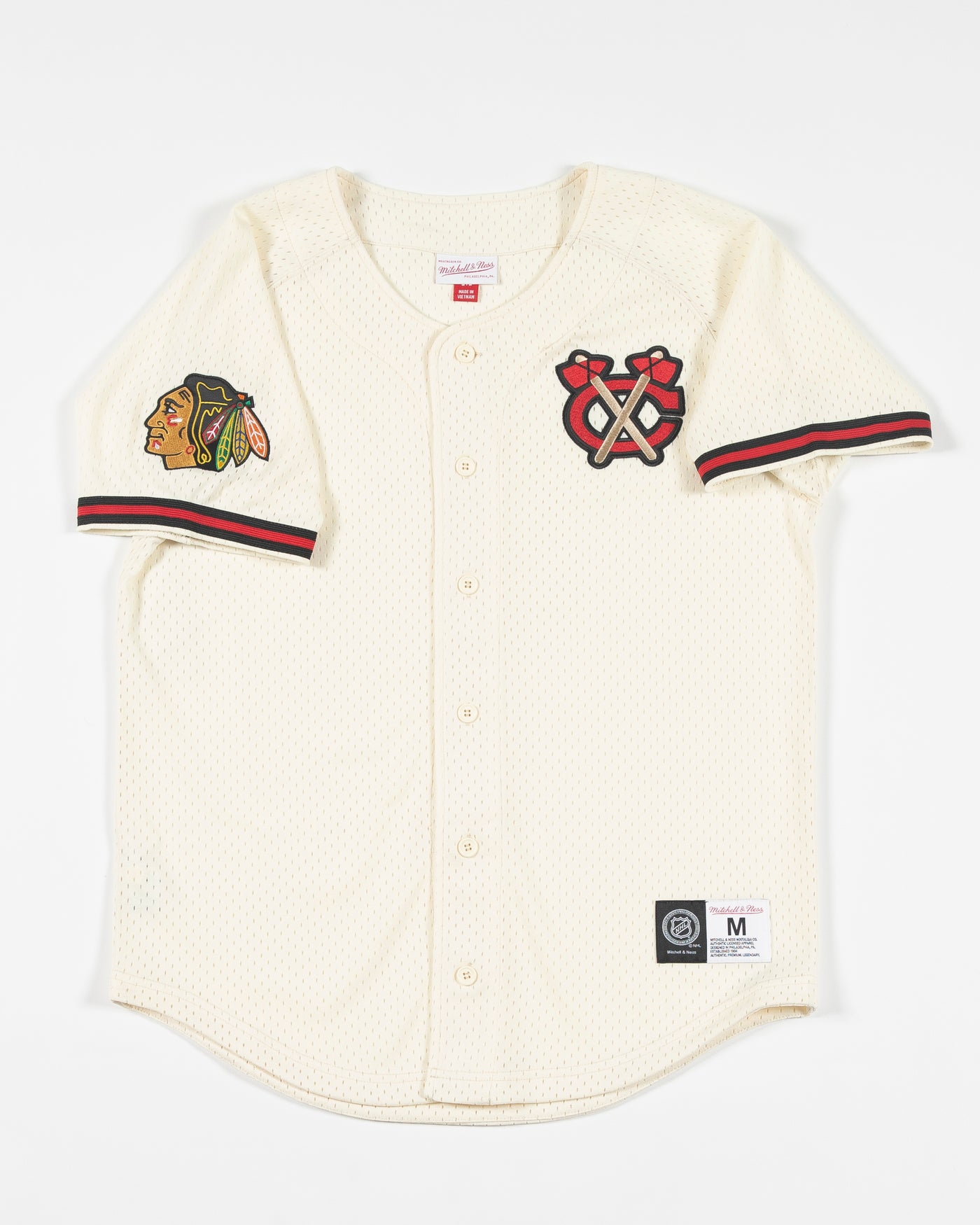 oatmeal Mitchell & Ness baseball inspired jersey with Chicago Blackhawks secondary logo on left chest and primary logo on right shoulder - front lay flat