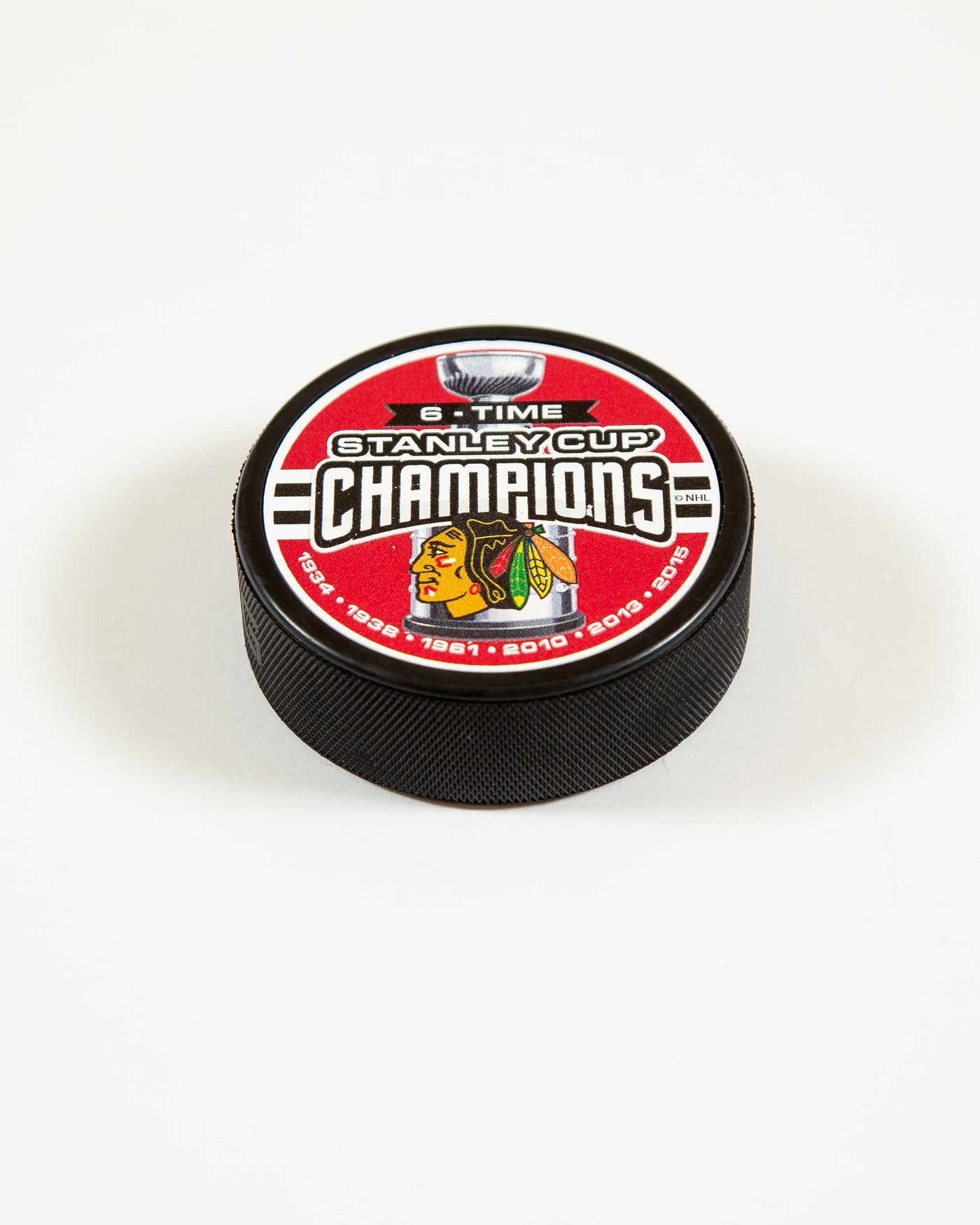 Chicago Blackhawks 6-tme Stanley Cup Champions designed puck - angled front view