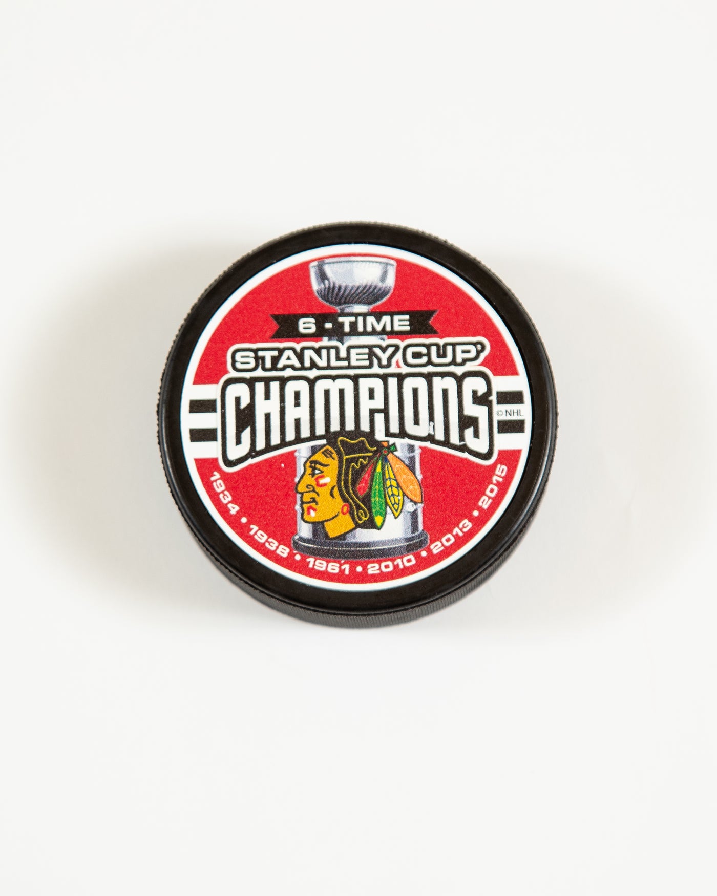 Chicago Blackhawks 6-tme Stanley Cup Champions designed puck - front angle