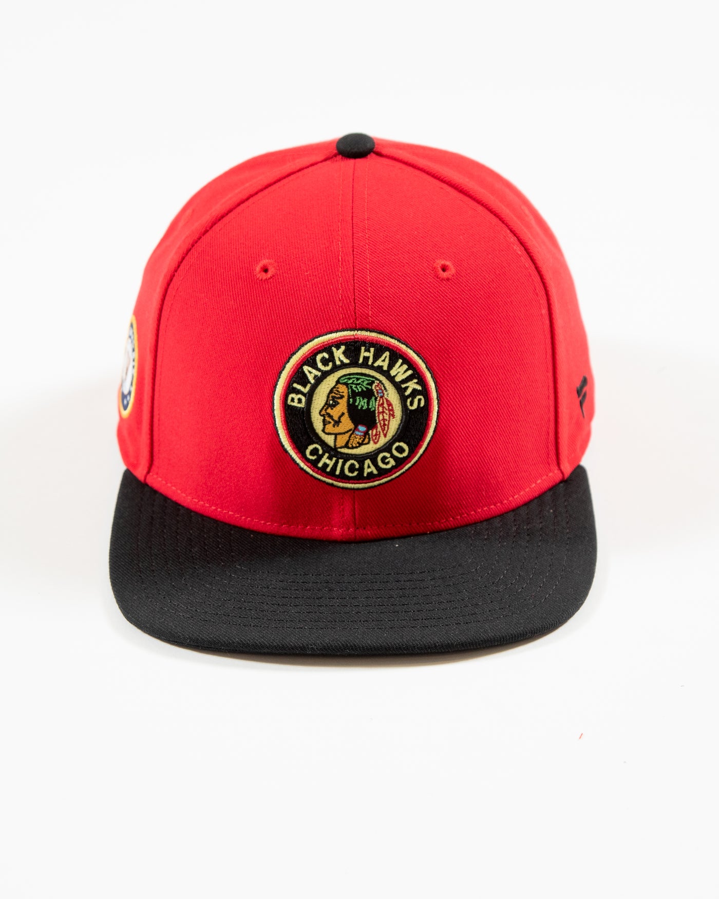 Red and black Fanatics snapback with vintage Chicago Blackhawks logo embroidered on front and original six patch embroidered on right side - front lay flat