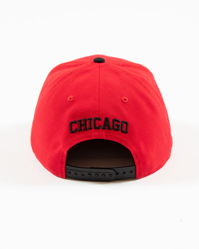 Red and black Fanatics snapback with vintage Chicago Blackhawks logo embroidered on front and original six patch embroidered on right side - back lay flat
