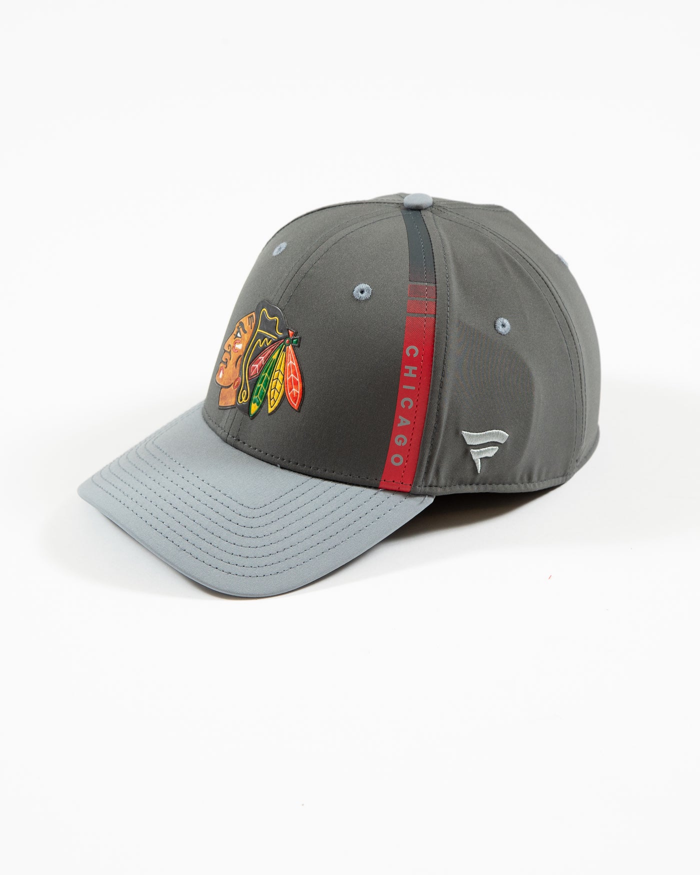 grey Fanatics fitted cap with Chicago Blackhawks primary logo on front and Chicago decal on left side - left side angle