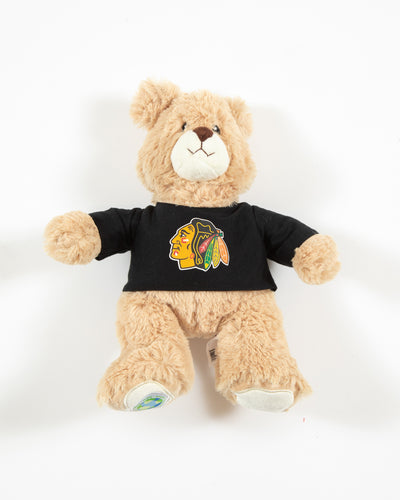 light tan teddy bear with black Chicago Blackhawks tshirt - front angle