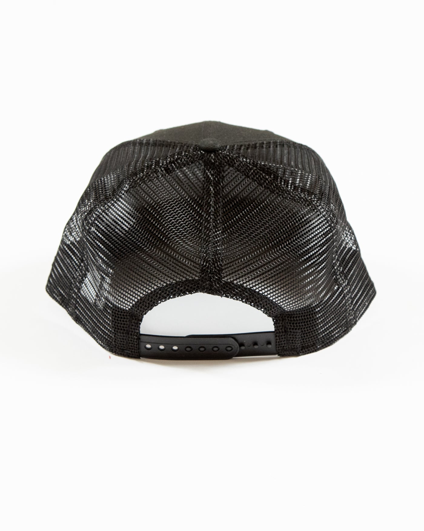 Black New Era adjustable trucker cap with tonal Chicago Blackhawks primary logo embroidered on the front - back lay flat