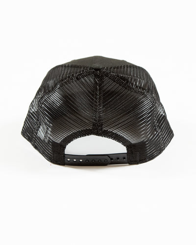 Black New Era adjustable trucker cap with tonal Chicago Blackhawks primary logo embroidered on the front - back lay flat