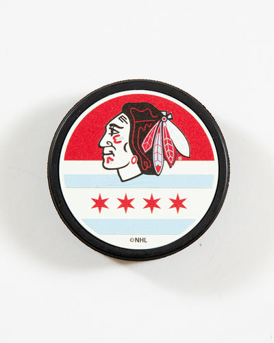Chicago Blackhawks puck with primary logo and Chicago flag in a Chicago flag-inspired colorway - front angle