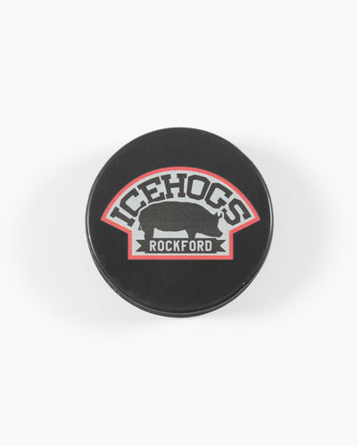 black hockey puck with Rockford IceHogs logo - front lay flat