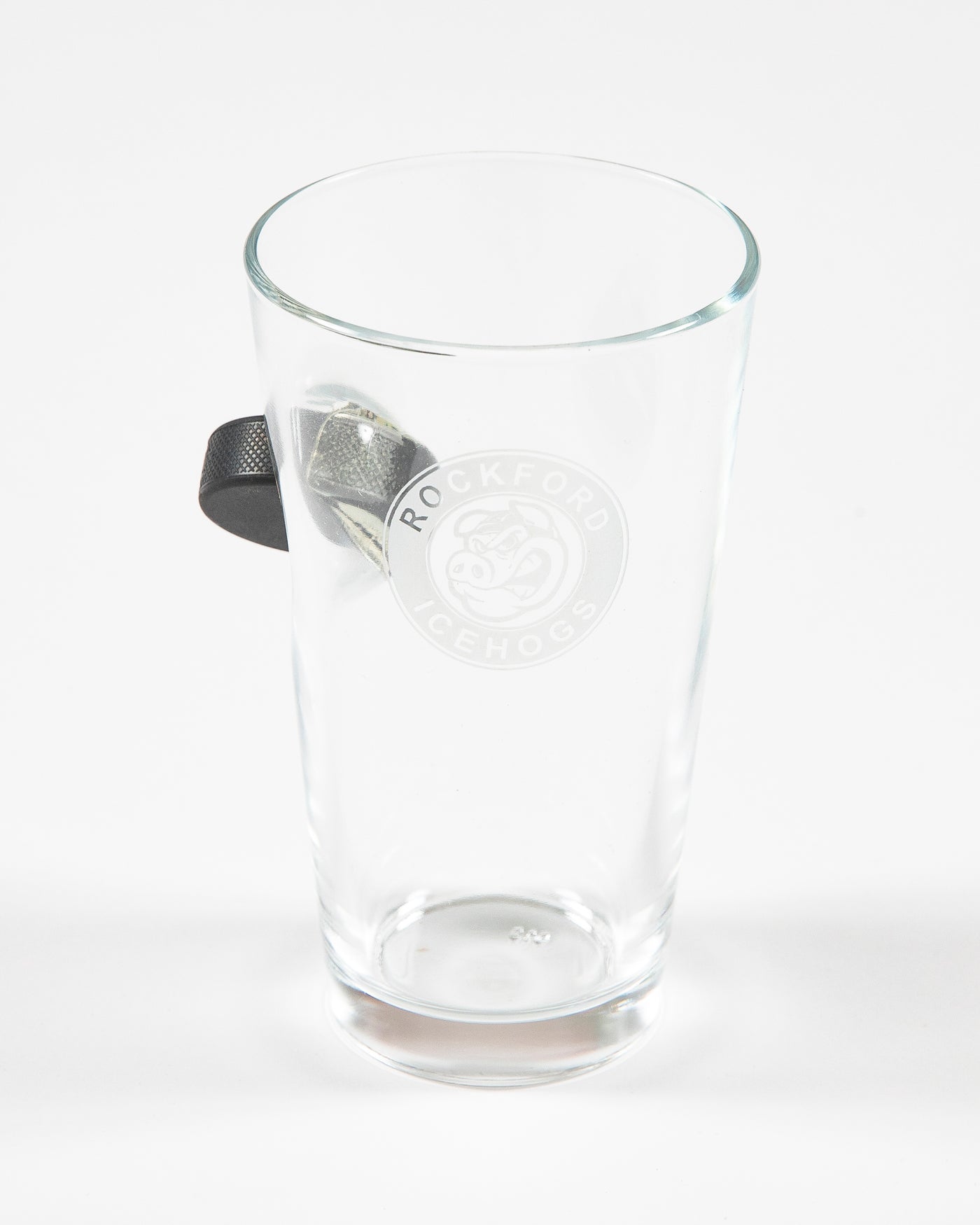 Rockford IceHogs pint glass with puck on side - front lay flat