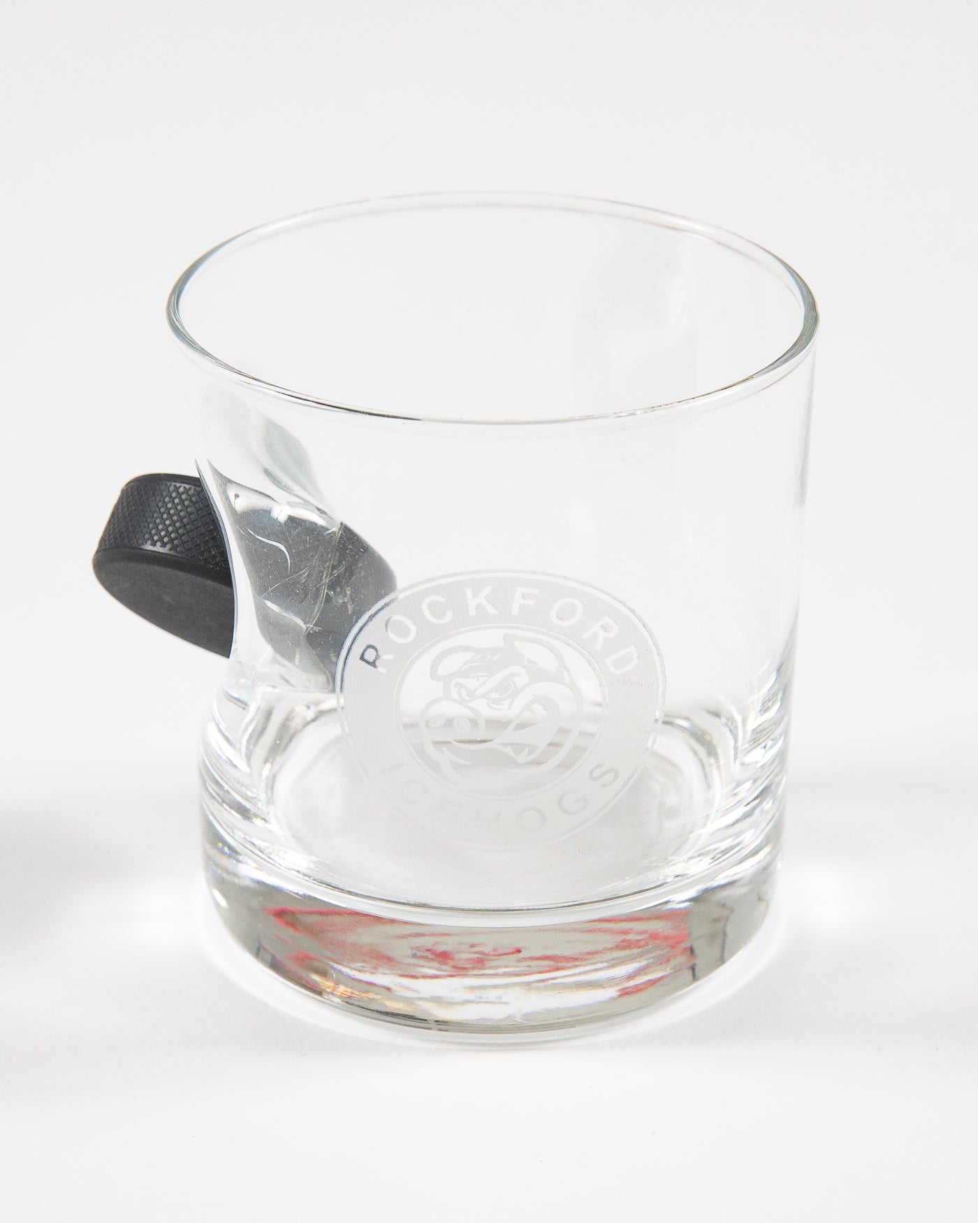 Rockford IceHogs rocks glass with puck going through glass - front lay flat