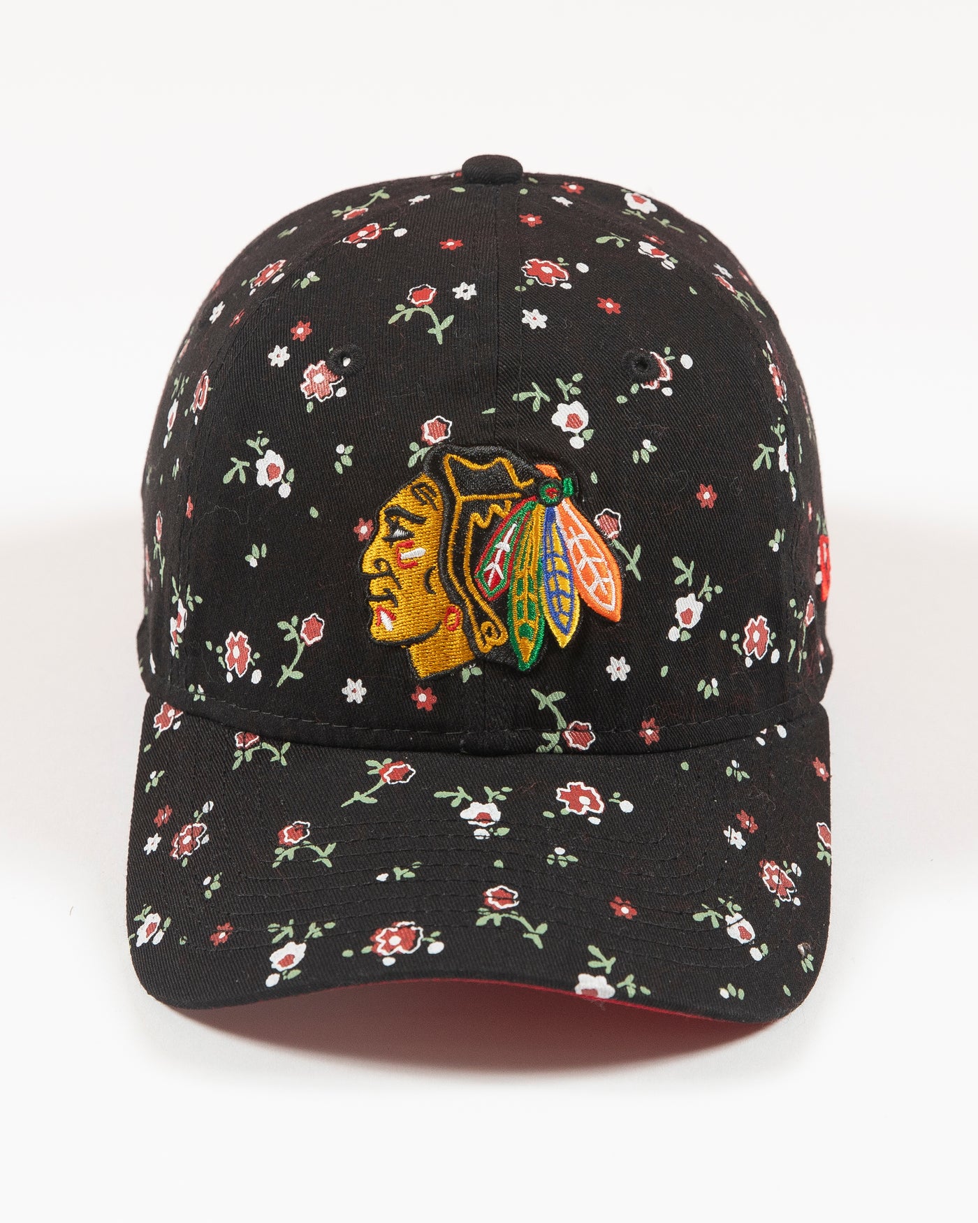 Black floral print New Era women's cap with Chicago Blackhawks primary logo embroidered on front - front lay flat