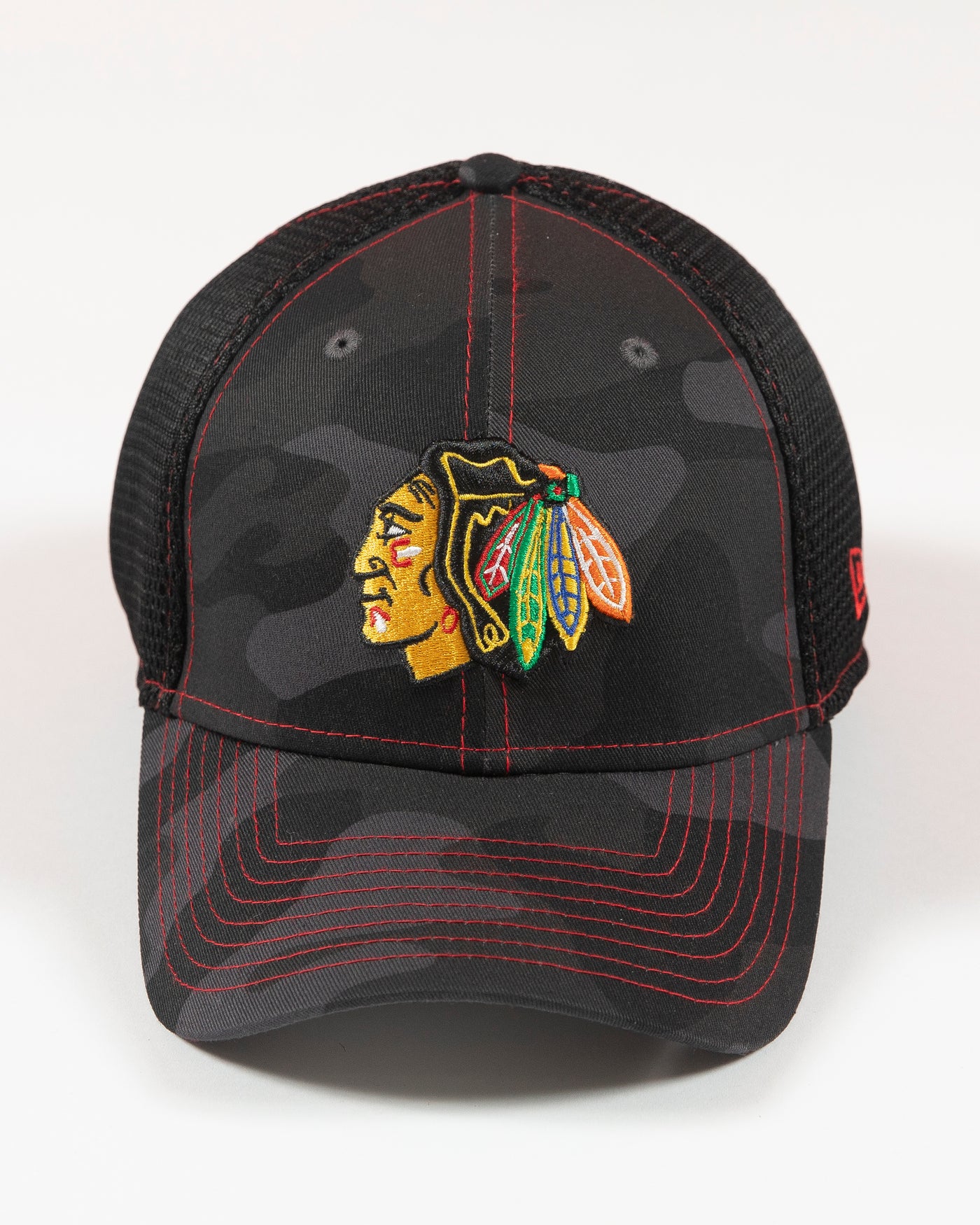 black camo New Era fitted cap with Chicago Blackhawks primary logo embroidered on front - front lay flat