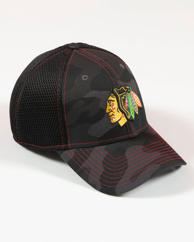 black camo New Era fitted cap with Chicago Blackhawks primary logo embroidered on front - right angle  lay flat