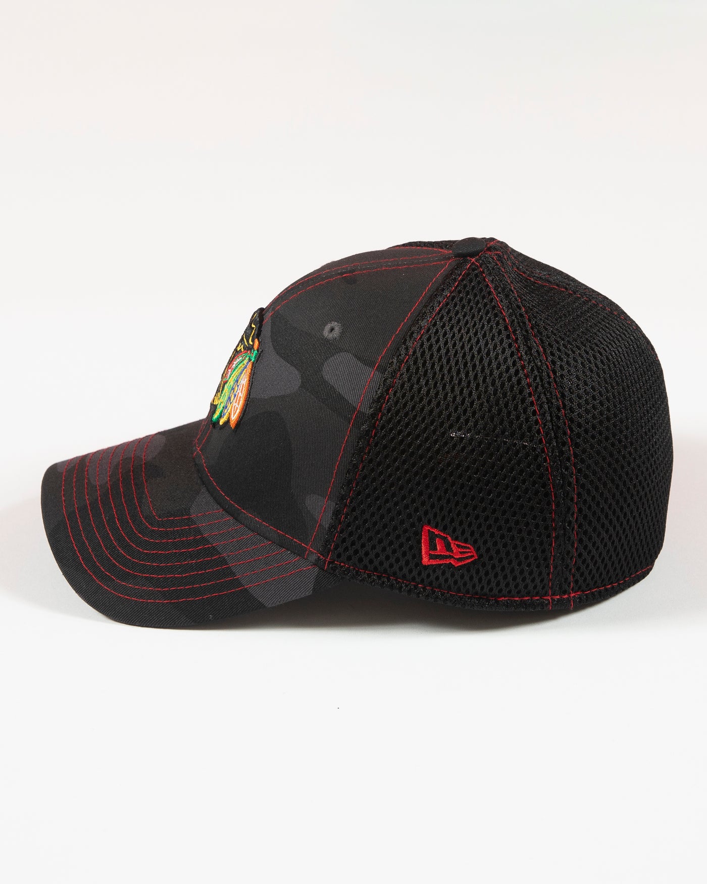 black camo New Era fitted cap with Chicago Blackhawks primary logo embroidered on front - left side lay flat